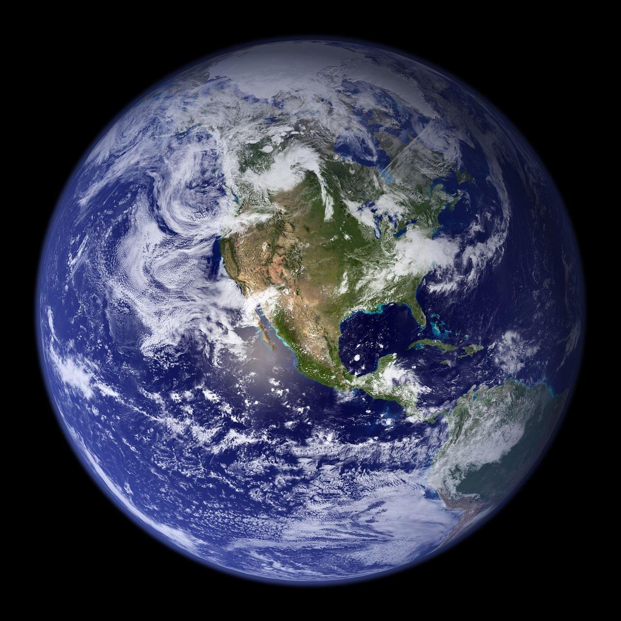 Vista del planeta Tierra desde el espacio, representando el modelo elipsoidal necesario para la precisión de la geodesia y la cartografía moderna.